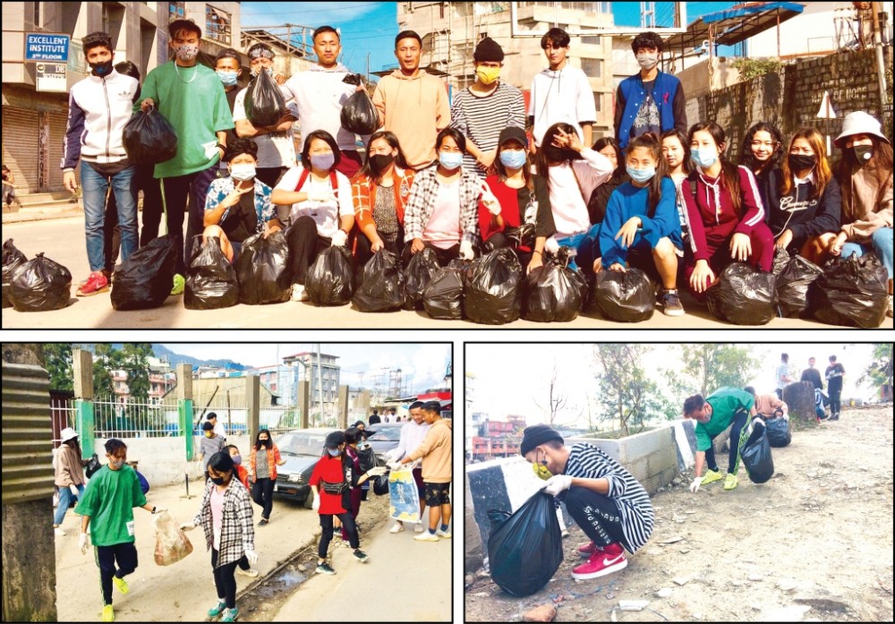 Members of Dance Fiesta Team take part in cleanliness drive in Kohima on October 18. The clean up held at PR Hill junction was supported by Kohima Municipal Council.